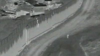A 4-year-old boy was dropped over a border barrier in San Diego. Agents who rushed to help came under fire