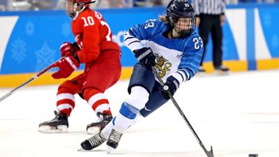 Feb 21, 2018; Gangneung, South Korea; Finland forward Sanni Hakala (23) moves the puck against Olympic Athlete from Russia forward Lyudmila Belyakova (10) in the women's ice hockey bronze medal match during the Pyeongchang 2018 Olympic Winter Games at K...