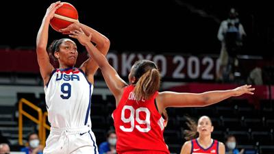 A'ja Wilson (USA) shoots the ball over a defender from Japan
